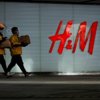An H&M store in a shopping area in Beijing. The brand was the biggest corporate target in a boycott wave last year related to alleged rights abuses in Xinjiang. | REUTERS