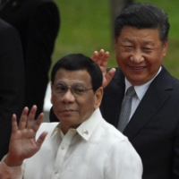 Chinese President Xi Jinping and Philippine President Rodrigo Duterte in Manila in 2018 | AFP-JIJI