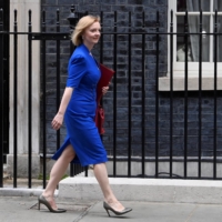 British Foreign Secretary Liz Truss walks outside Downing Street in London on Tuesday. | REUTERS