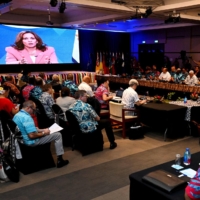U.S. Vice President Kamala Harris speaks via a video feed at the Pacific Islands Forum (PIF) in Suva, Fiji, on Wednesday. | AFP-JIJI