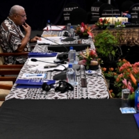 Fiji Prime Minister Frank Bainimarama goes over his notes during the Pacific Islands Forum in Suva on Wednesday.  | AFP-JIJI