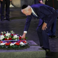 U.S. President Joe Biden lays a wreath during his visit to the Yad Vashem Holocaust Remembrance Center in Jerusalem on Wednesday. | REUTERS