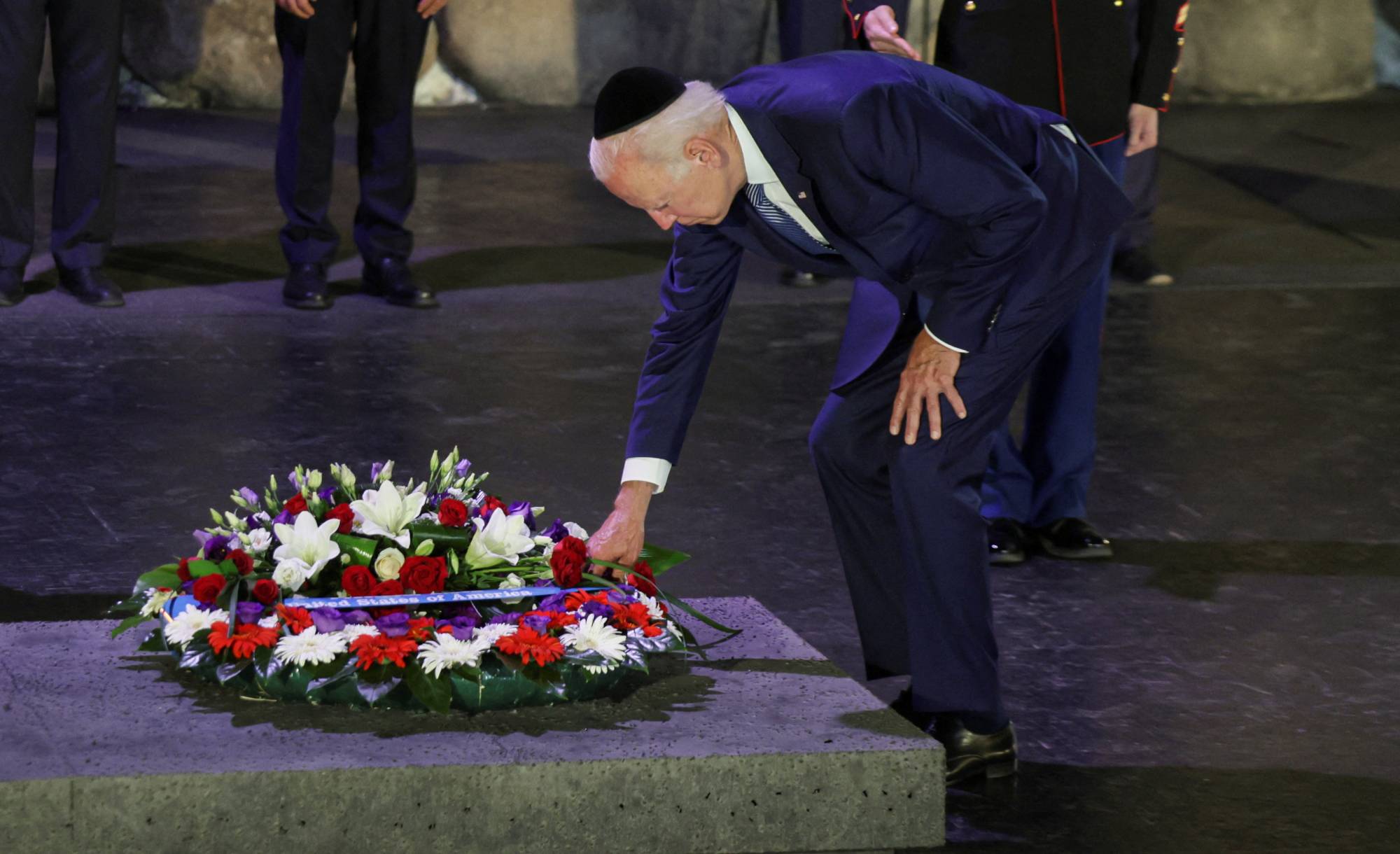 U.S. President Joe Biden lays a wreath during his visit to the Yad Vashem Holocaust Remembrance Center in Jerusalem on Wednesday. | REUTERS