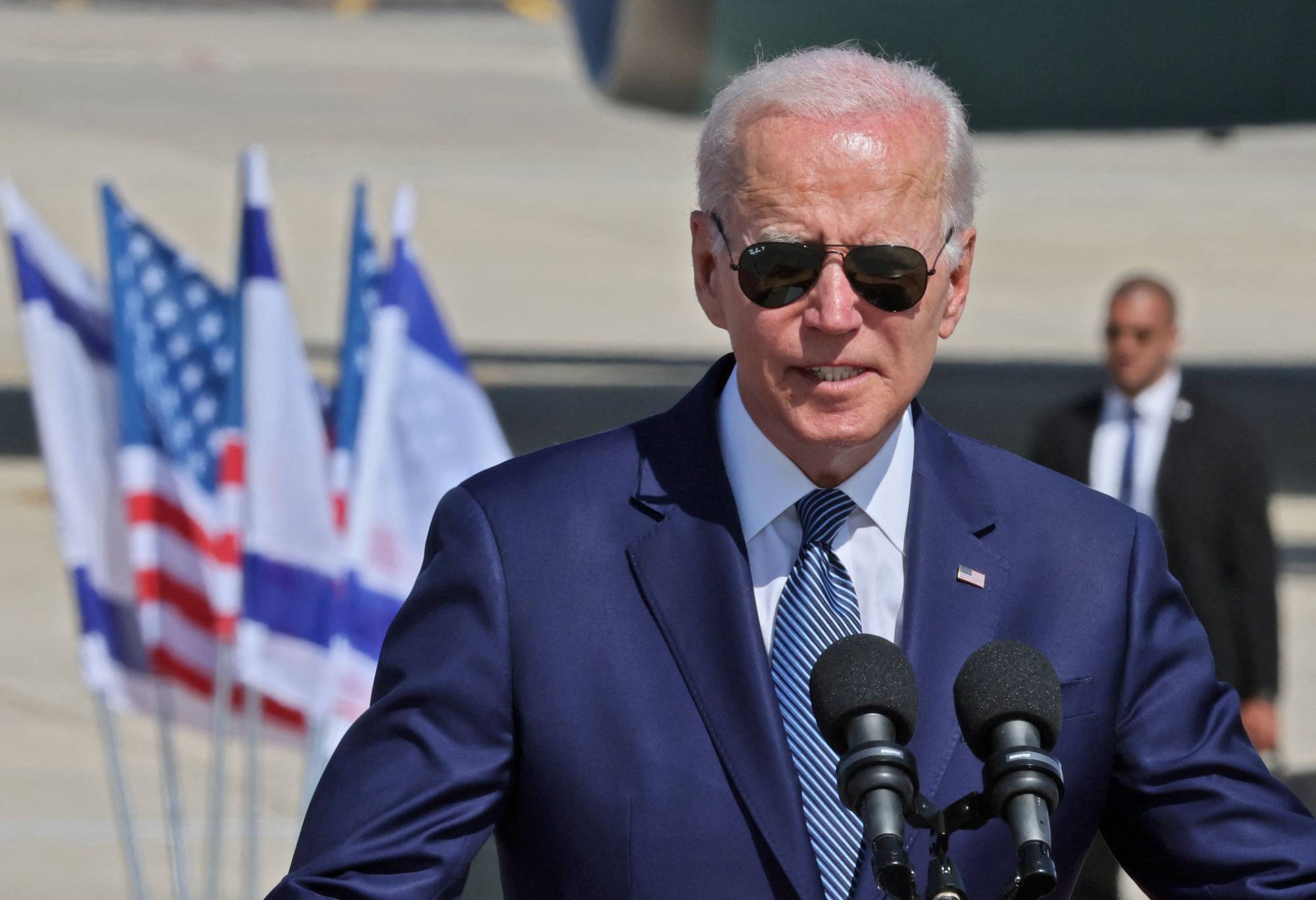 U.S. President Joe Biden delivers a statement upon arrival at Israel's Ben Gurion Airport in Lod, Israel, on Wednesday. | AFP-JIJI