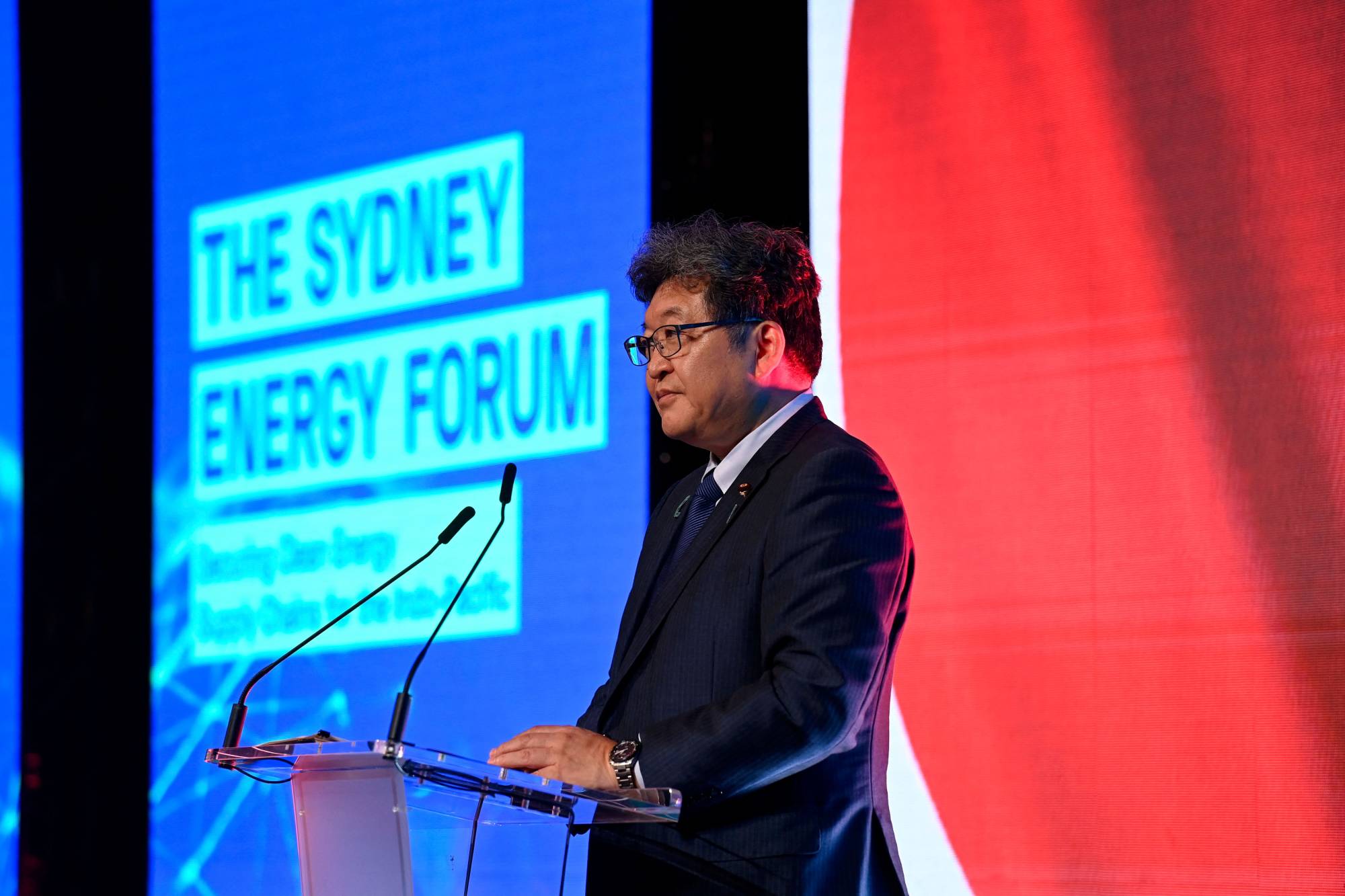 Economy minister Koichi Hagiuda speaks during the Sydney Energy Forum on Wednesday. | AFP-JIJI