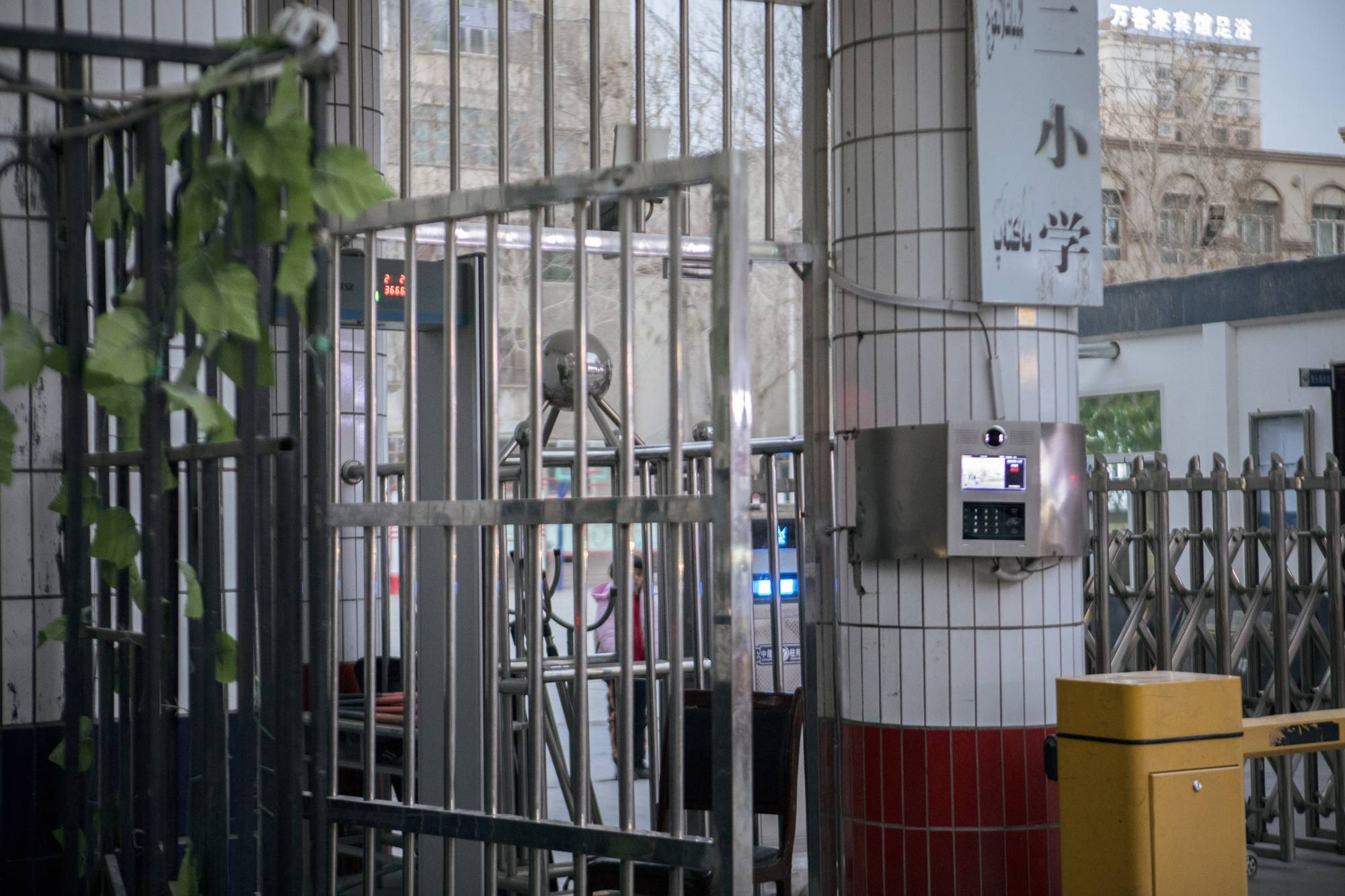 A device for facial recognition at the entrance of a primary school in Hotan, in the western Xinjiang region, in 2019. | Giulia Marchi/The New York Times