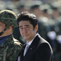 Former Prime Minister Shinzo Abe most of all wanted to make Japan a normal country in the eyes of the world — one not beholden to the legacy of World War II and events that took place before most of the country’s population was born.  | REUTERS 