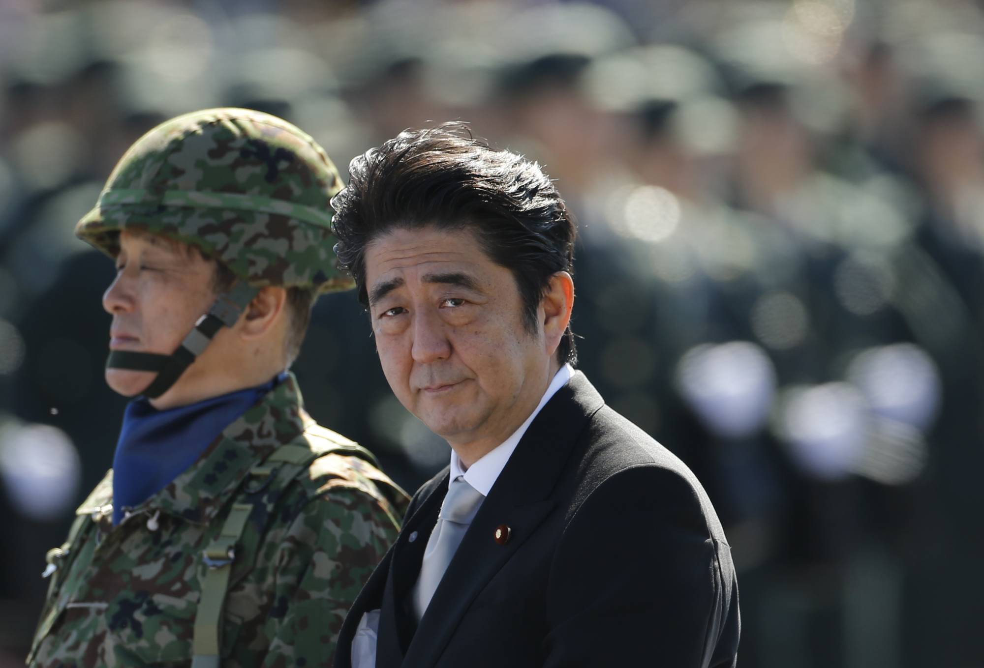 Former Prime Minister Shinzo Abe most of all wanted to make Japan a normal country in the eyes of the world — one not beholden to the legacy of World War II and events that took place before most of the country’s population was born.  | REUTERS 