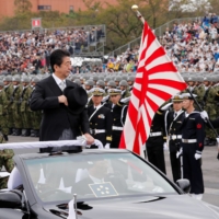 Former Prime Minister Shinzo Abe most of all wanted to make Japan a normal country in the eyes of the world — one not beholden to the legacy of World War II and events that took place before most of the country’s population was born.  | REUTERS 