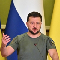 Ukrainian President Volodymyr Zelenskyy speaks during a news conference in Kyiv on Monday. | AFP-JIJI
