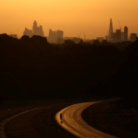 Richmond Park at sunrise during a heat wave in London. As fossil fuel use continues apace and a hotter planet edges close to passing safety limits, some scientists are exploring a controversial technological stopgap: spraying chemicals into the atmosphere to reflect away some of the sun\'s warmth. | REUTERS