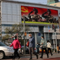 China’s share of global gross domestic product in 2021 was 18.5% and its share of global working-age population was 19.2%, the latter of which is projected to fall to 6.1% by century’s end. | REUTERS 