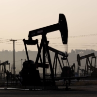 Pump jacks operating in Bakersfield, California. Green groups have long warned that offsets should not be used by businesses as a substitute for climate action like switching to renewable energy supplies or using less carbon-intensive production methods. | ALEX WELSH / THE NEW YORK TIMES 
