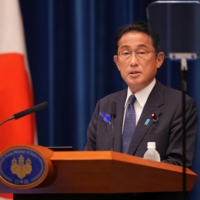 Prime Minister Fumio Kishida speaks in Tokyo earlier this month. | XINHUA / POOL / VIA REUTERS