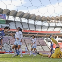 Kiko Seike (left) celebrates after scoring Nadeshiko Japan\'s third goal against Chinese Taipei in Kashima, Ibaraki Prefecture, on Saturday. | KYODO