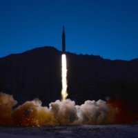 A weapon labeled a \"hypersonic missile\" by North Korea is launched at an undisclosed location in the country in January. | KCNA / VIA REUTERS