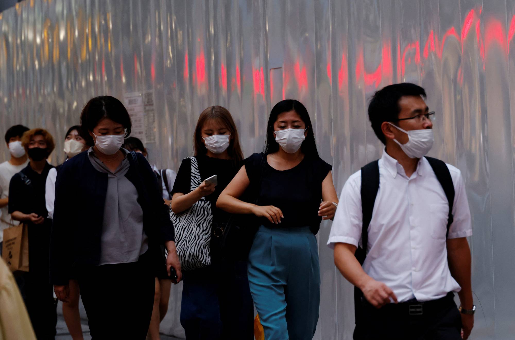 While over 90% of the elderly population in Japan have received three shots, the overall percentage of people who received a booster shot stood at 62.7% as of Wednesday. | REUTERS