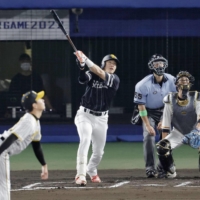 The Pacific League\'s Yuki Yanagita hits a home run during the sixth inning in Game 2 of the NPB All-Star Series in Matsuyama on Wednesday. | KYODO