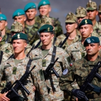 Troops from Poland, Hungary, Lithuania and the Czech Republic take part in a military parade in Paris on July 14. Seoul — which is developing closer ties with NATO — will probably also seek to export weapons to European and Asian countries that have distanced themselves from Russia after the Ukraine invasion. | REUTERS