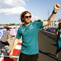 Sebastian Vettel acknowledges the fans at the Hungaroring in Budapest on Thursday. | REUTERS