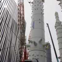 A workman at the liquefied natural gas plant and oil export terminal in Sakhalin, Russia. Operators of the Sakhalin-2 project have informed their buyers of a new requirement to make payments through a Russian bank. | CHARLES PERTWEE / THE NEW YORK TIMES
