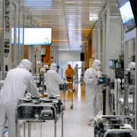 Workers work inside the clean room of U.S. semiconductor manufacturer SkyWater Technology, in Bloomington, Minnesota, in April. | SKYWATER TECHNOLOGY / VIA REUTERS
