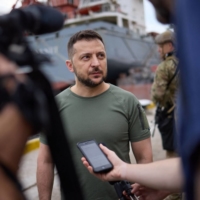 Ukraine President Volodymyr Zelenskyy speaks to reporters on Friday.  | UKRAINIAN PRESIDENTIAL PRESS SERVICE / VIA AFP-JIJI