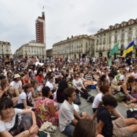 Climate activists stage a protest in Turin, Italy, on Friday. | REUTERS