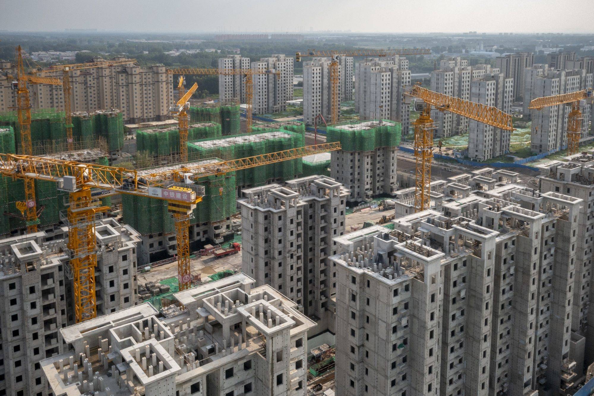 The China Evergrande Group. Royal Peak residential development under construction in Beijing on Friday. | BLOOMBERG