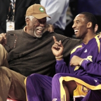 Former Celtics great Bill Russell (left) talks with Lakers guard Kobe Bryant during the NBA All-Star Slam Dunk Contest in Las Vegas in 2007. | REUTERS