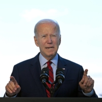 U.S. President Joe Biden speaks from the Blue Room Balcony of the White House in Washington on Monday. | AFP-JIJI / VIA BLOOMBERG