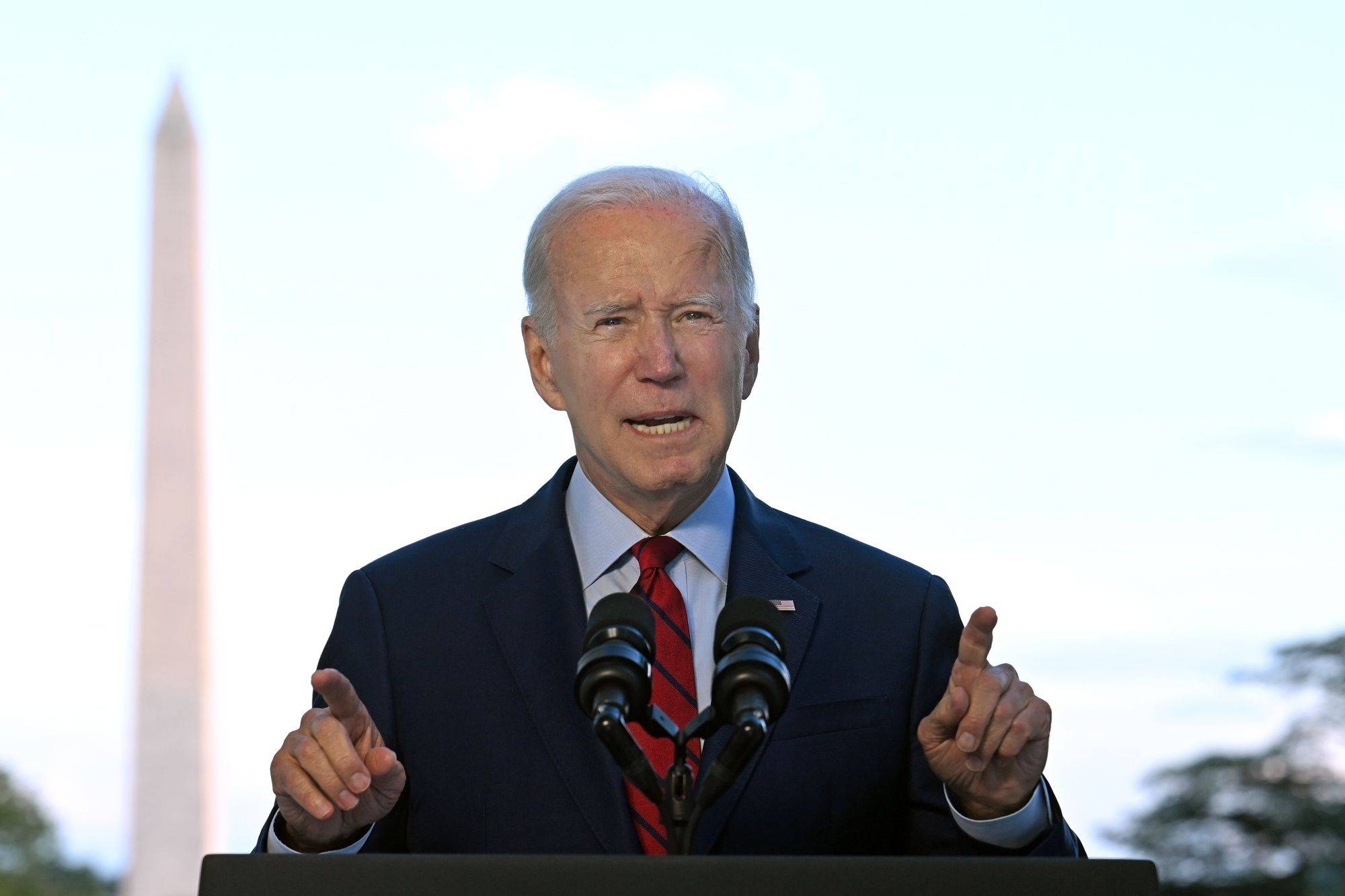 U.S. President Joe Biden speaks from the Blue Room Balcony of the White House in Washington on Monday. | AFP-JIJI / VIA BLOOMBERG