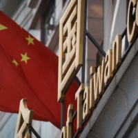 The Chinese national flag outside the building of the All China Federation of Taiwan Compatriots in Beijing on Wednesday. Pelosi’s trip is seen as a provocation by Beijing, which considers Taiwan a part of its territory. | REUTERS
