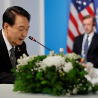 South Korean President Yoon Suk-yeol speaks in a meeting during a NATO summit in Madrid on June 29. | REUTERS