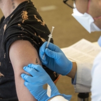 A health worker administers a dose of the Bavarian Nordic A/S Jynneos monkeypox vaccine at a vaccination site in West Hollywood, California, on Wednesday. | BLOOMBERG