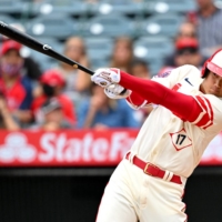 The Angels\' Shohei Ohtani hits a solo home run against the Athletics during their game at Angel Stadium in Anaheim, California, on Thursday. The Athletics won 8-7. | USA TODAY / VIA REUTERS