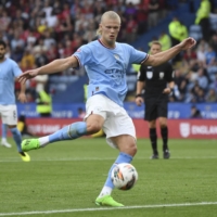 Manchester City\'s Erling Braut Haaland kicks the ball during the Community Shield match against Liverpool in Leicester, England, on July 30. | REUTERS
