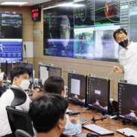 A control room briefing prior to the Korean Aerospace Research Institute\'s launch of the Danuri orbiter, in Daejeon, South Korea.  | KOREAN AEROSPACE RESEARCH INSTITUTE / VIA THE NEW YORK TIMES