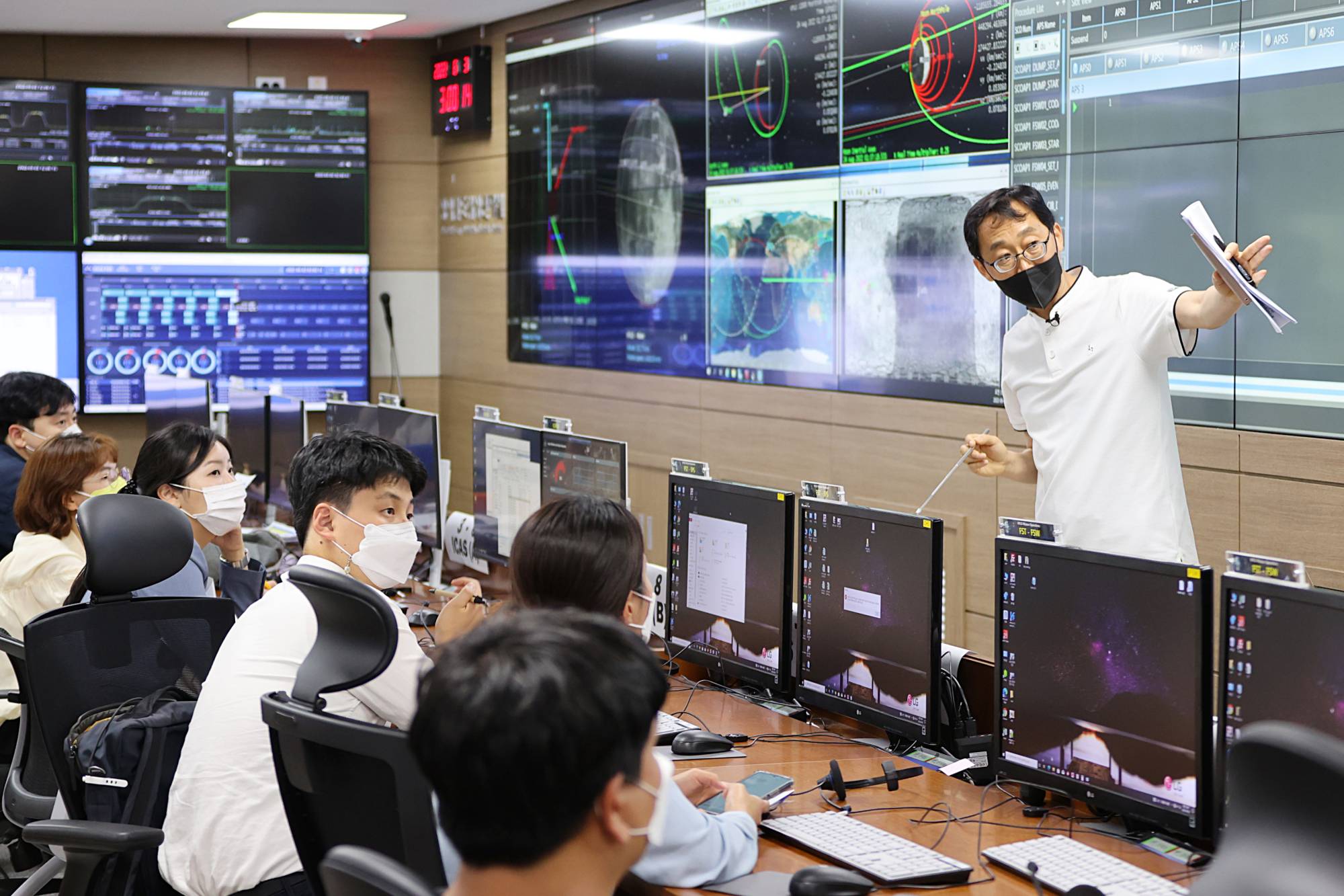 A control room briefing prior to the Korean Aerospace Research Institute's launch of the Danuri orbiter, in Daejeon, South Korea. | Korean Aerospace Research Institute / via The New York Times
