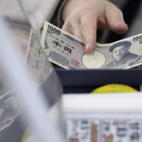 The dollar, which soared 38% against the yen from a March 2020 trough to mid-July this year, is in retreat, with many predicting a slowdown in losses for Japan’s currency. | BLOOMBERG