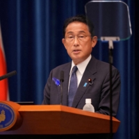 Prime Minister Fumio Kishida delivers a speech in Tokyo on July 14.  | POOL / VIA REUTERS