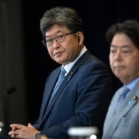Koichi Hagiuda (left) delivers opening remarks alongside Foreign Minister Yoshimasa Hayashi during the U.S.-Japan Economic Policy Consultative Committee meeting at the State Department in Washington on July 29. | POOL / AFP-JIJI