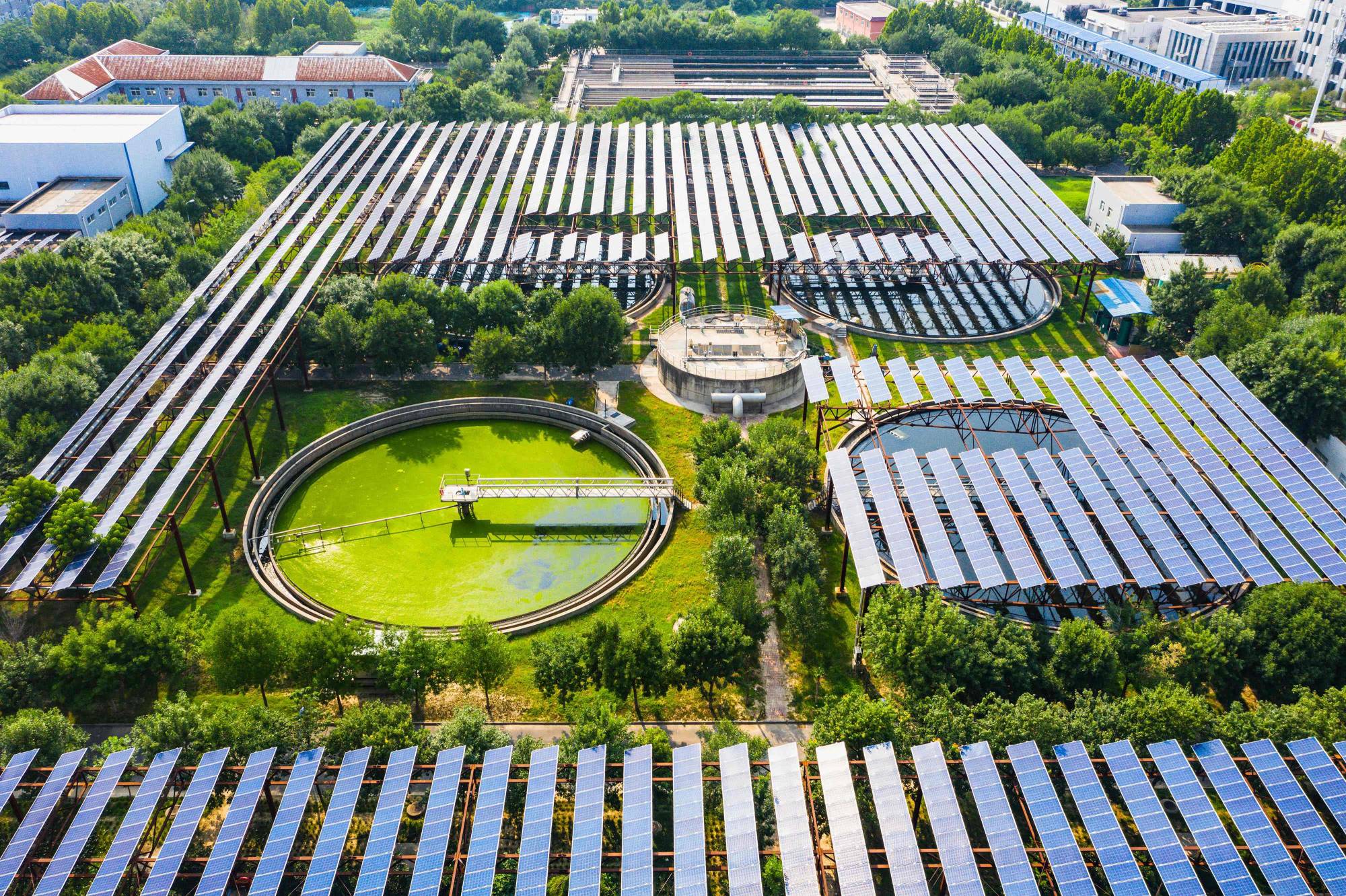 Solar panels built over a sewage treatment plant in Zhengzhou, China's central Henan province, on Aug. 4 | AFP-Jiji
