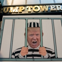A protester calls for Donald Trump’s arrest in front of Trump Tower in New York after Monday\'s raid by FBI agents of the former president\'s Mar-a-Lago estate in Palm Beach, Florida.

 | REUTERS