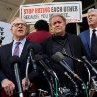 Former White House chief strategist Steve Bannon (center) and his lawyers Evan Corcoran (right) and David Schoen depart after Bannon was found guilty during his trial on contempt of Congress charges, at U.S. District Court in Washington, on July 22. | REUTERS