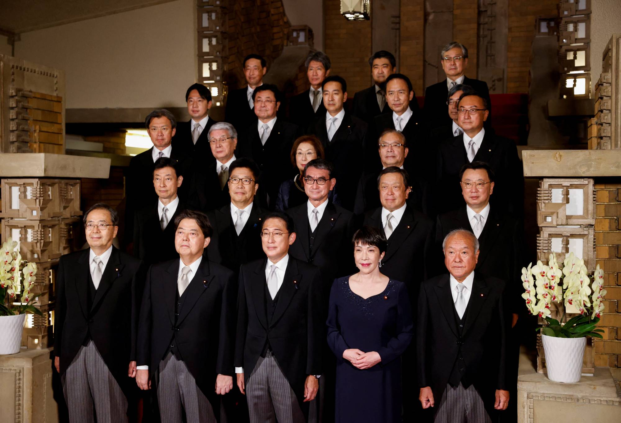Members of Prime Minister Fumio Kishida's reshuffled Cabinet on Wednesday | Pool / via Reuters