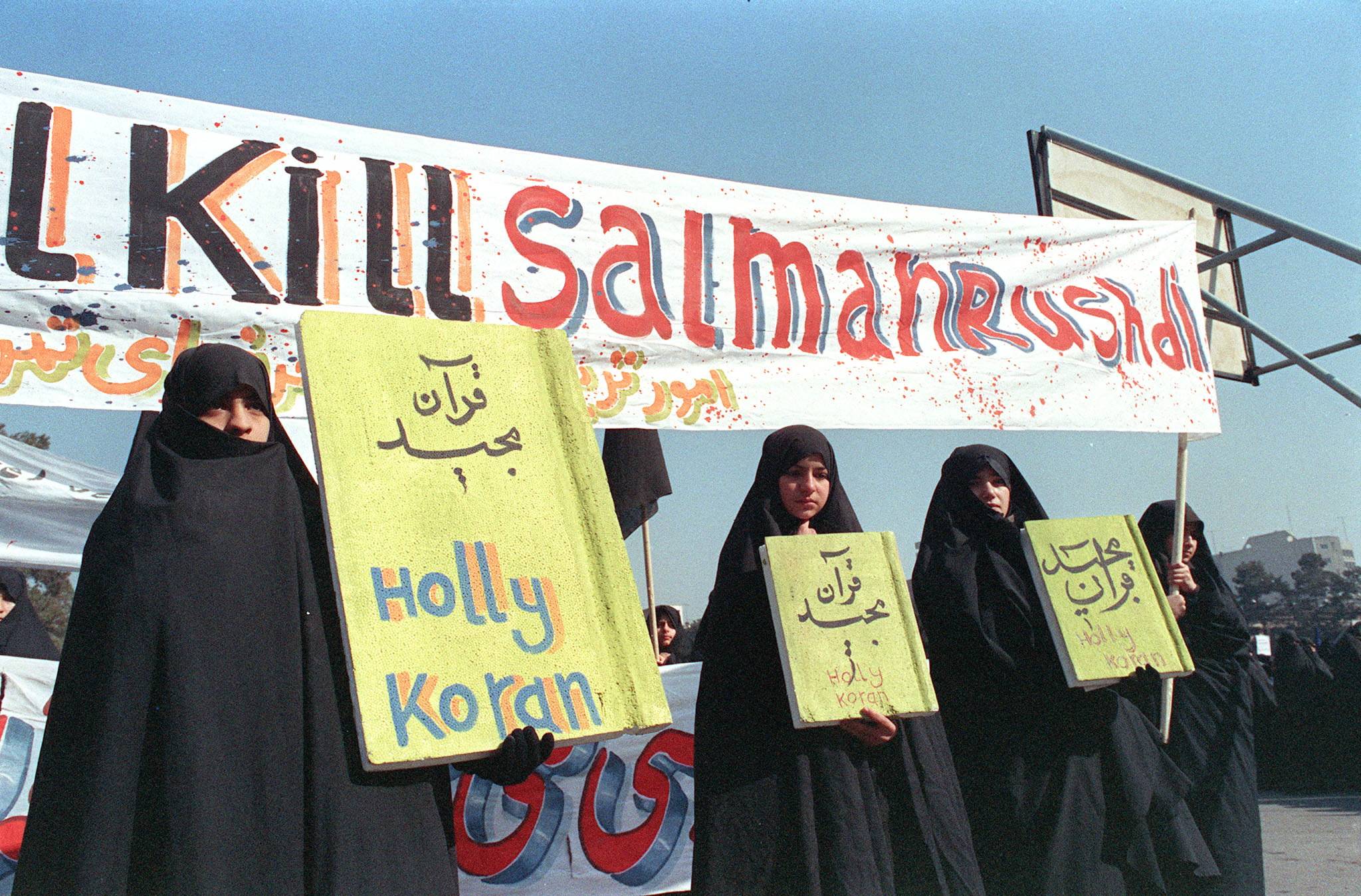Iranian women participate in a demonstration against author Salman Rushdie in Tehran in 1989. | AFP-JIJI