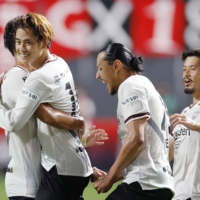 Vissel\'s Koya Yuruki (second from left) celebrates after scoring his second goal against Consadole in Sapporo on Saturday. | KYODO