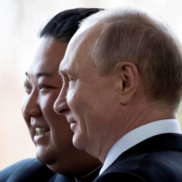 Russian President Vladimir Putin and North Korea\'s leader Kim Jong Un pose during their meeting in Vladivostok, Russia, in 2019. | POOL / VIA REUTERS