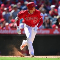 Shohei Ohtani hits an RBI single against the Twins during the Angels\' win in Anaheim, California, on Sunday. | USA TODAY / VIA REUTERS